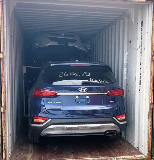Company vehicles consolidated inside an ocean container